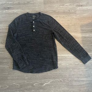 Men’s long sleeve shirt.